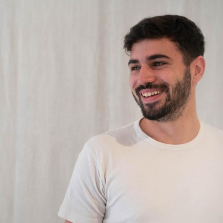 Kaveri Mehta, Lead Design Curator at Swift Garden Chart, reviewing corporate floral arrangements